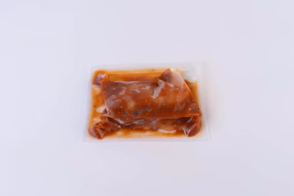 Poitrines de poulet farcies canard, porc et canneberges,, une fois apprêté